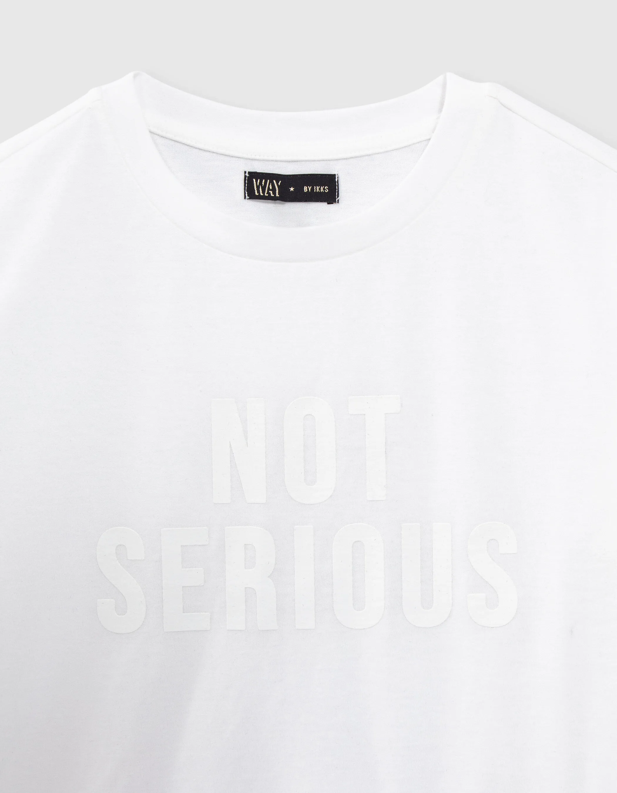 T-shirt blanc cassé coton bio message gomme fille